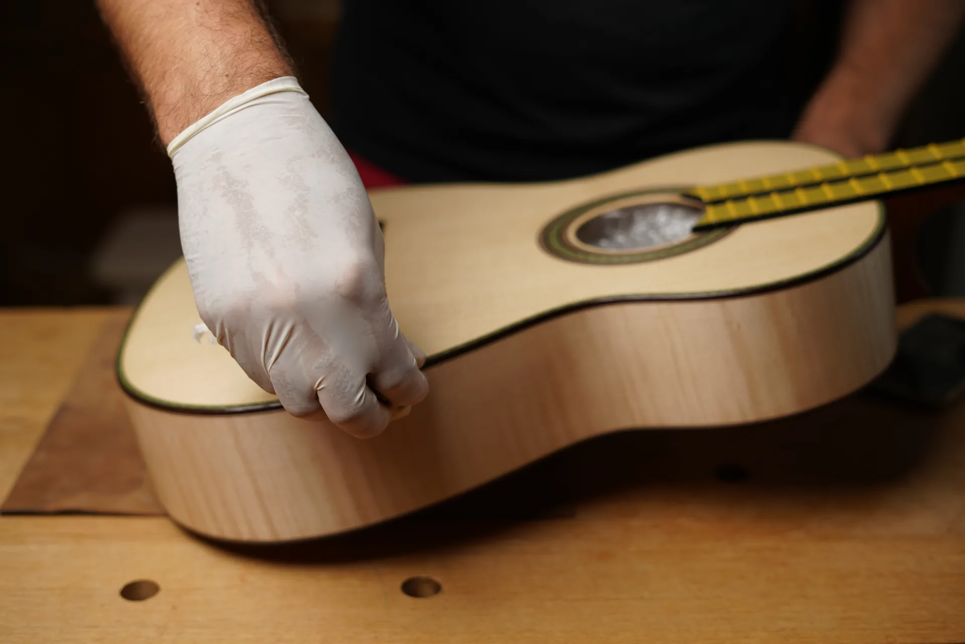 Edges and purfling corners — more exposed to wear, require adequate varnish build