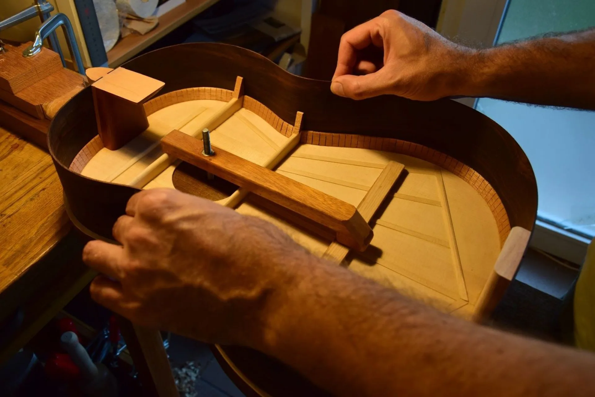 Closing the box — applying glue by hand