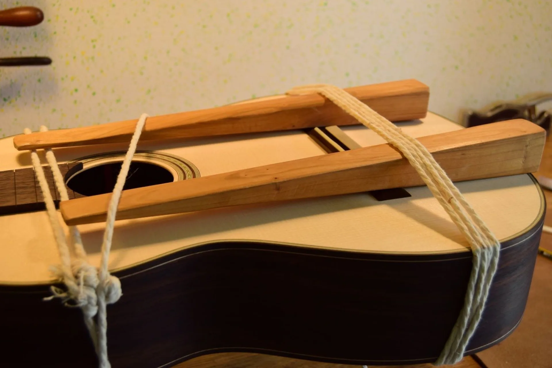 Gluing the bridge with string and wedges
