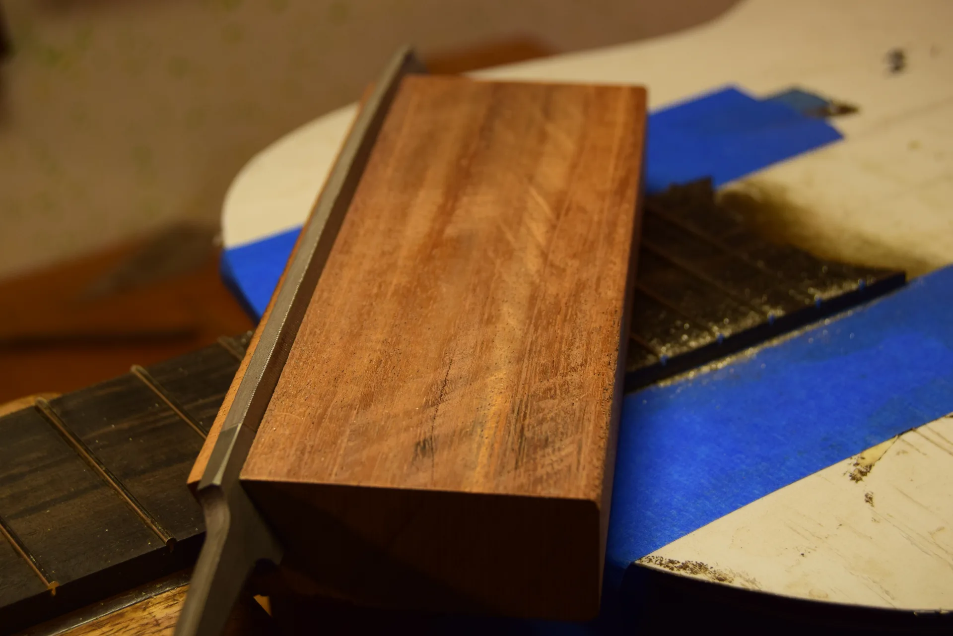 Creating a bevel along fret ends — the desired angle is generally between 30 and 35 degrees