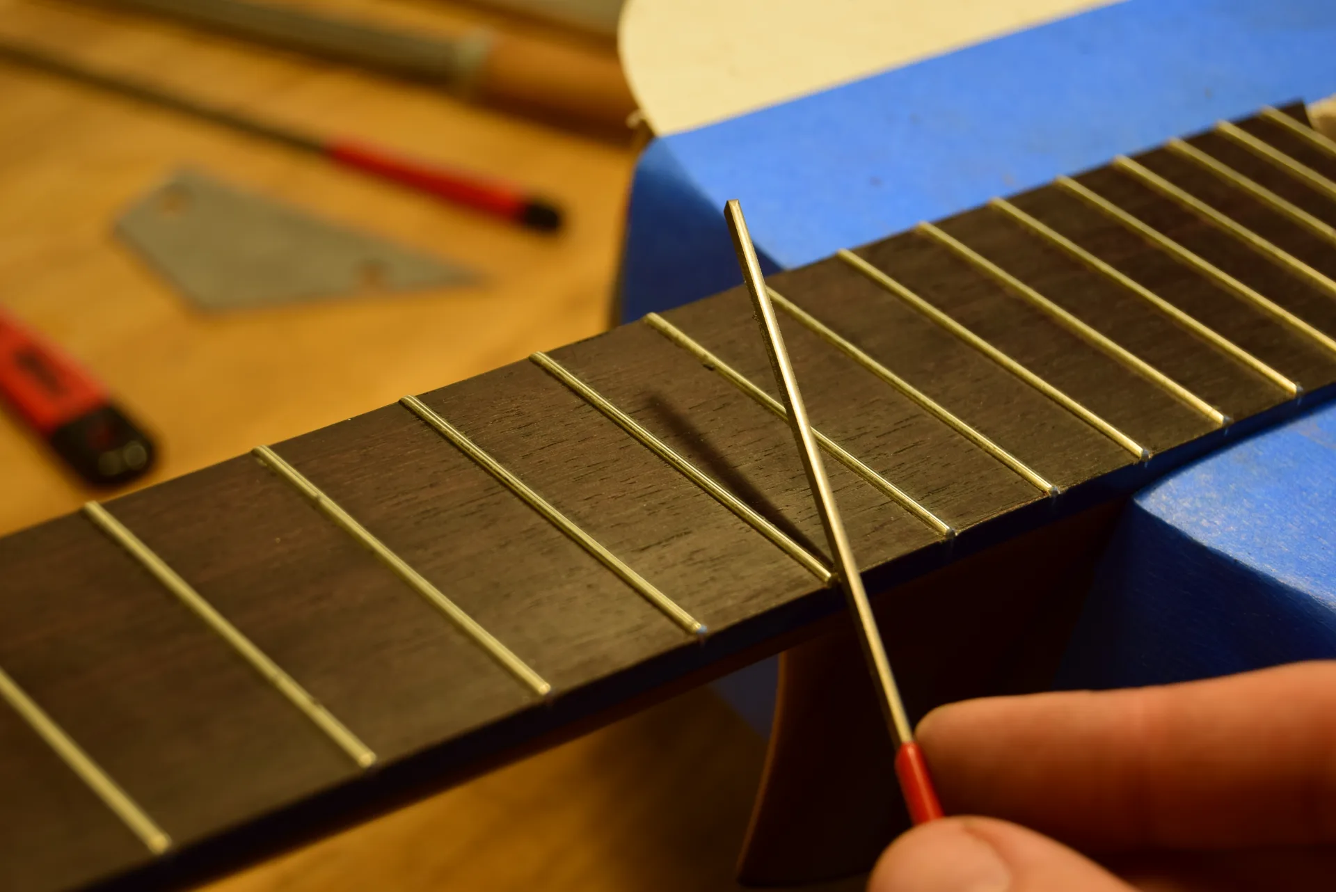 Rounding fret ends with a small specialized file