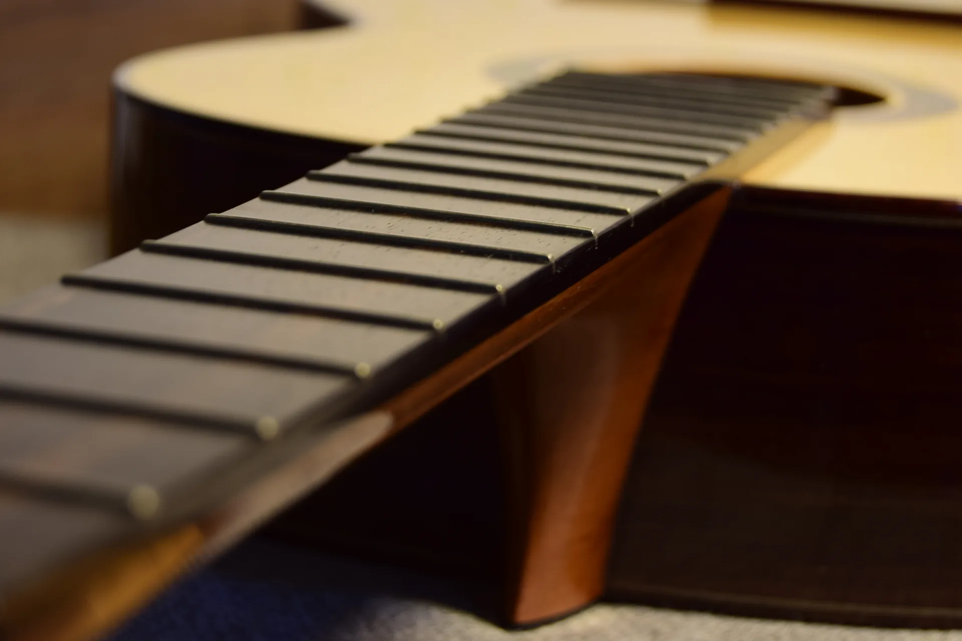 A small amount of drying oil applied to nourish and protect the fingerboard — the final step