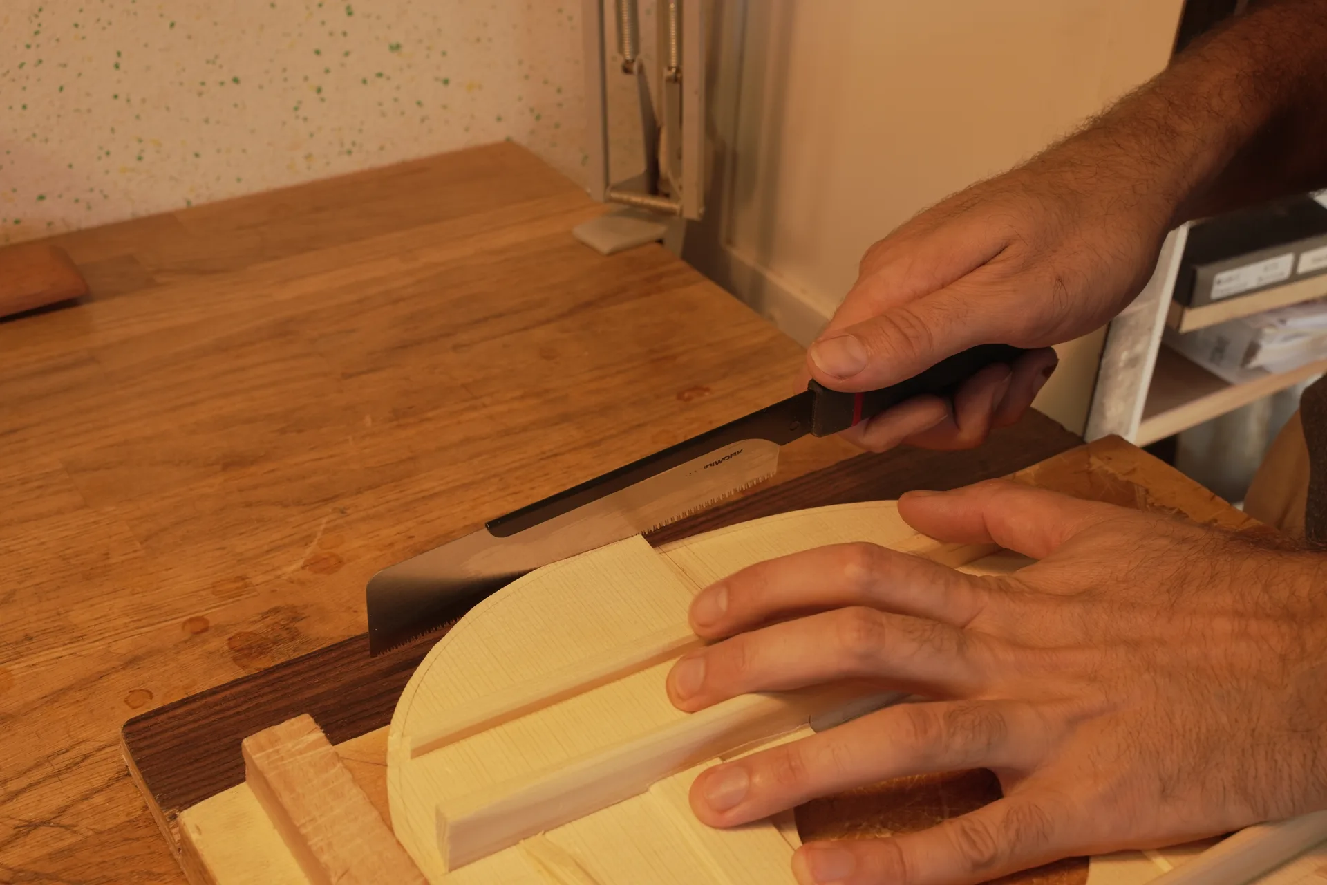 Soundboard joined to the neck to establish the central axis