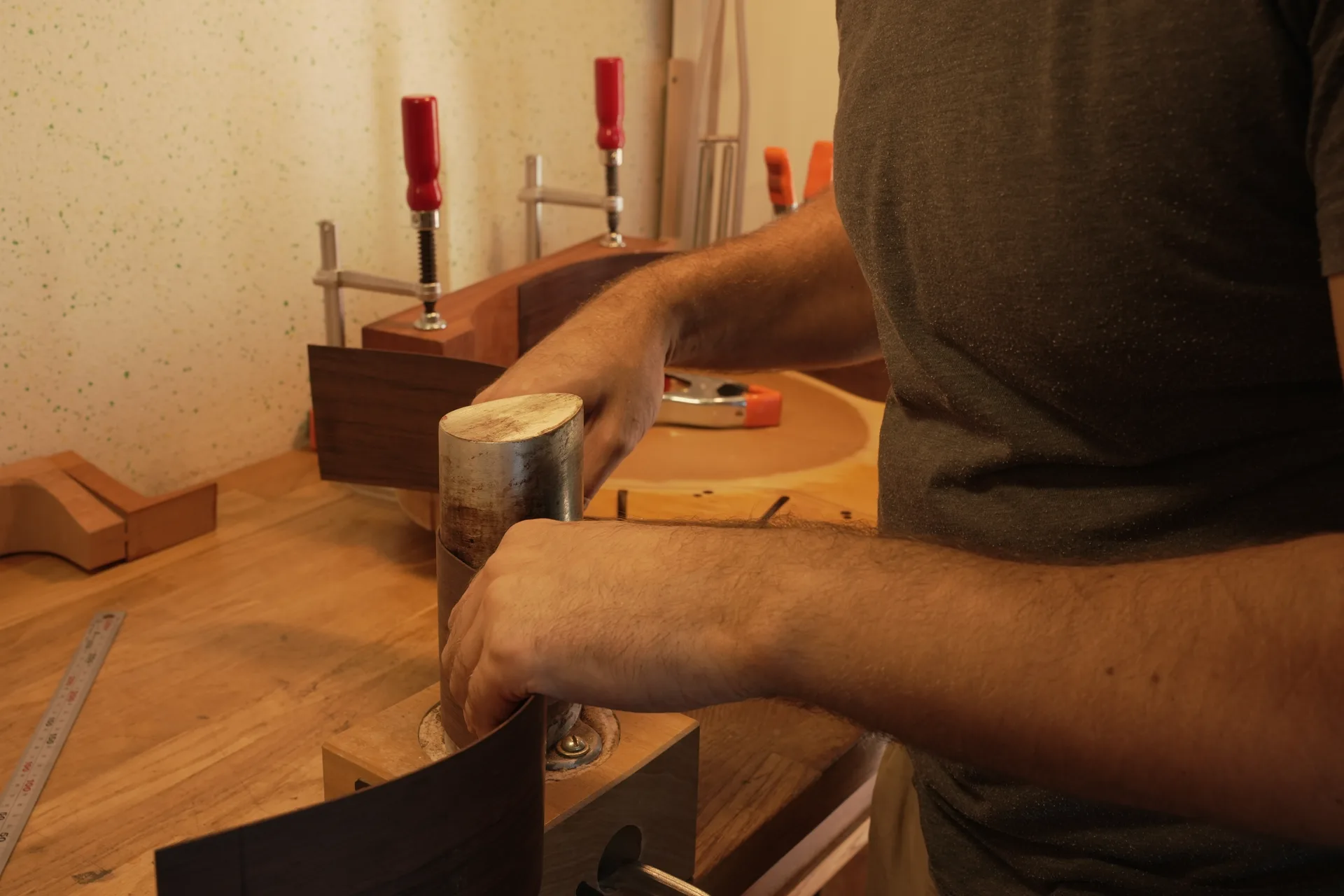 Refining the curvature of the sides on a bending iron