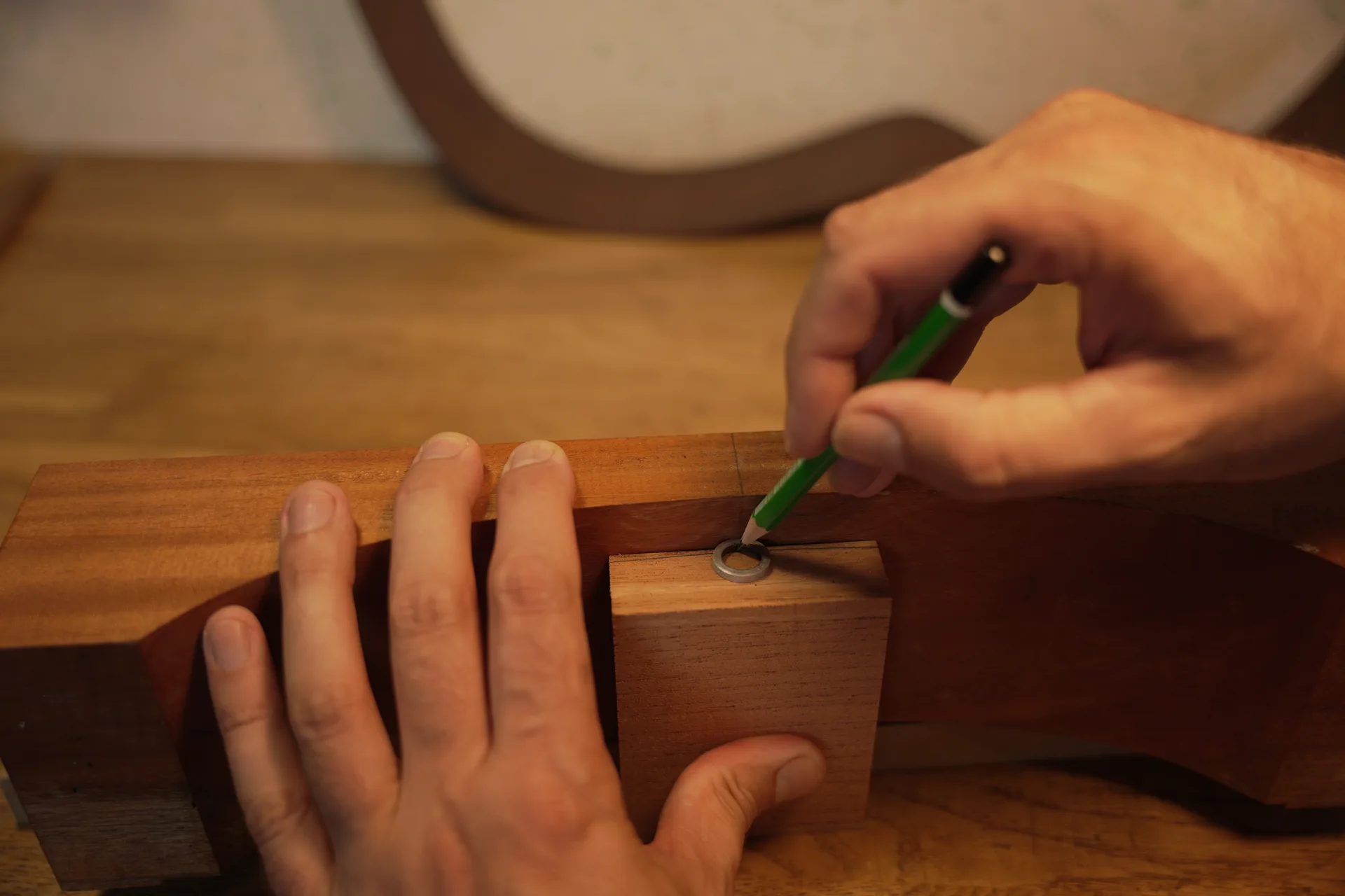 Cedar end block shaped to match the guitar outline