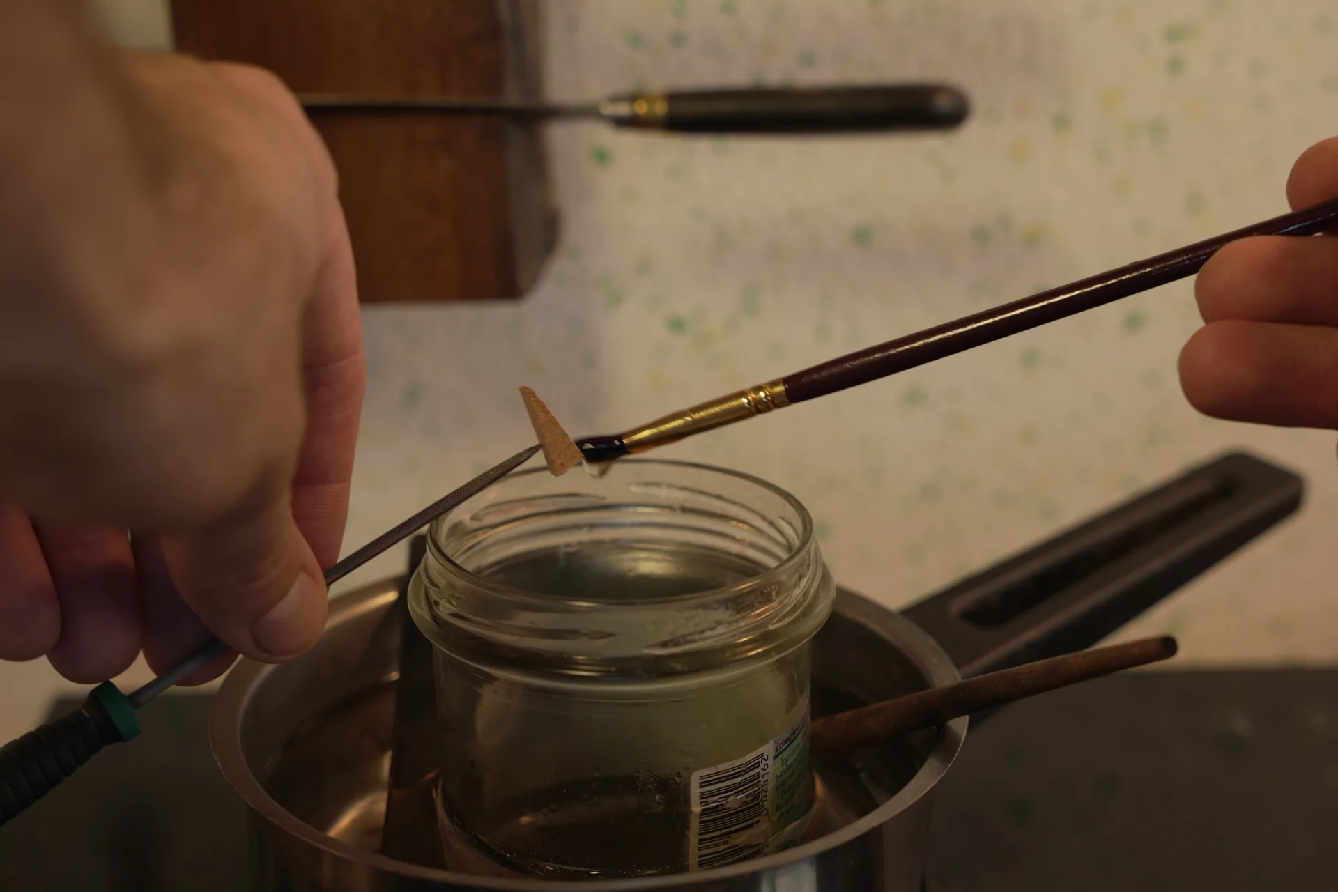 Small pointed tool used to handle lining blocks during gluing