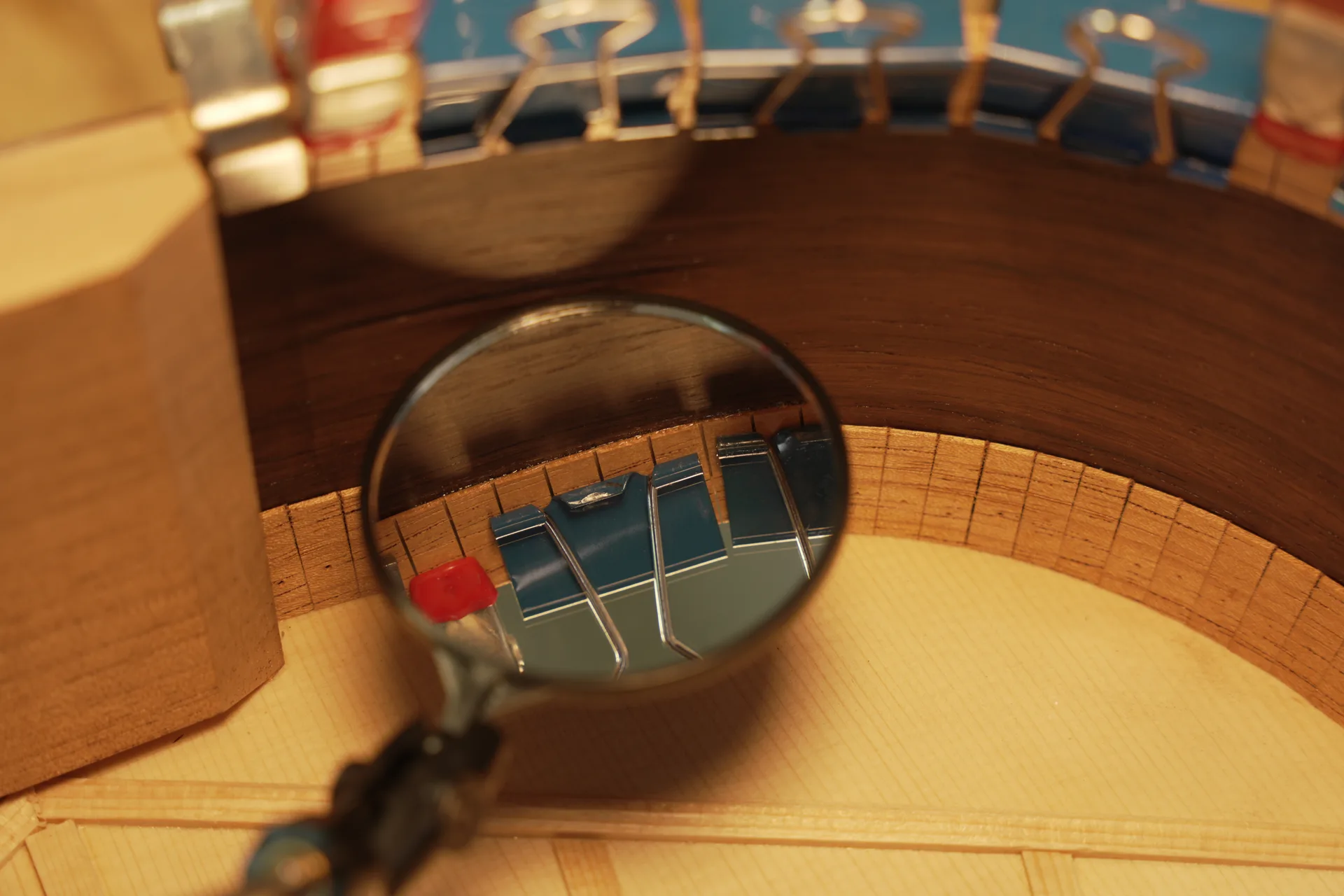 Binder clips used to glue the linings, with mirror to check joints